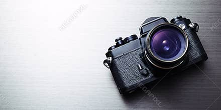 Vintage Camera on Brushed Aluminum Background, Industrial Nostalgia