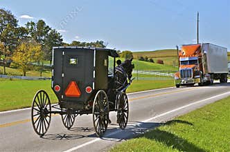 Amish buggies meets semi on highway