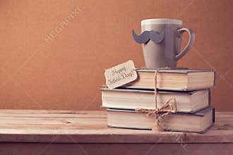 Cup of tea and old books for Father's Day celebration