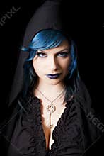 Hooded dark woman with blue hair and lipstick. Key pendant