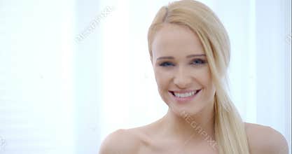 Head and Shoulder Shot of Cheerful Bare Woman
