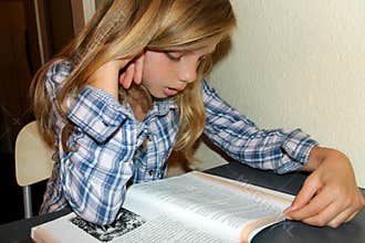 Teenager girl reading