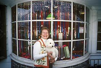 Woman and dog Christmas shopping, Woodstock, NY