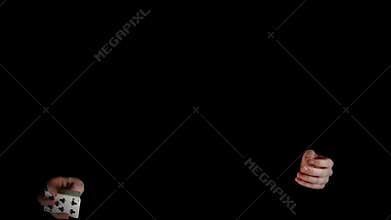 Trick of magician with card, throwing cards on