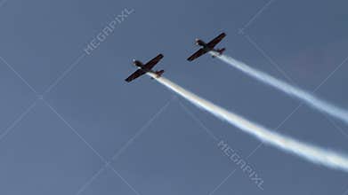 View of twin-engined planes fly in formation