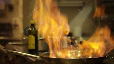 Flambe food in pan