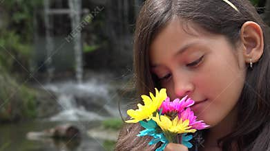 Happy Young Girl at Waterfall