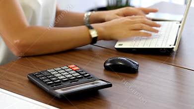 Girl working in an office close up workplace