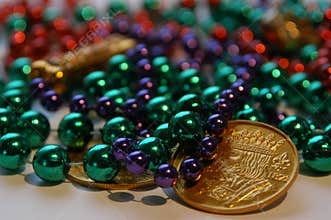 Mardi gras beads and coins
