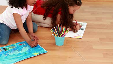Little children drawing together in class