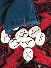 Runes Spilling out of a Bag