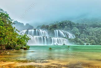 Ban Gioc Waterfall misty in the morning dew