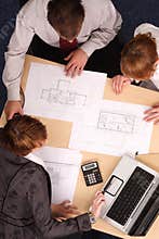 Architects studying plans