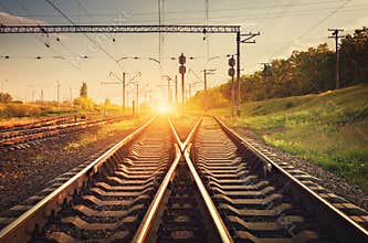 Cargo train platform at sunset. Railroad. Railway station