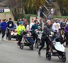 Mothers, father, and babies at the Drumstick Dash, Roanoke, Virginia, USA