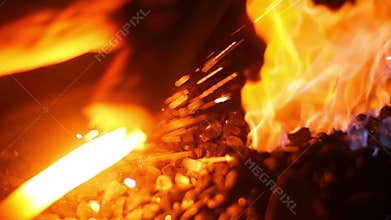 Blacksmith Forging a Swords with Fire Sparks