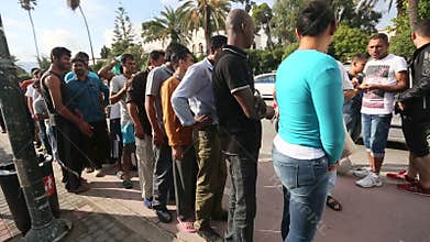 War refugees receive humanitarian assistance - bread. More than half are migrants from Syria