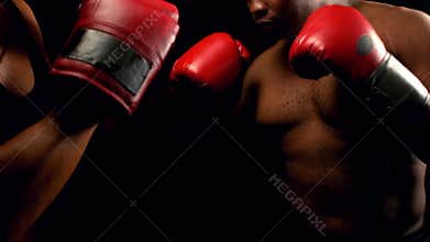 Couple boxing with each other