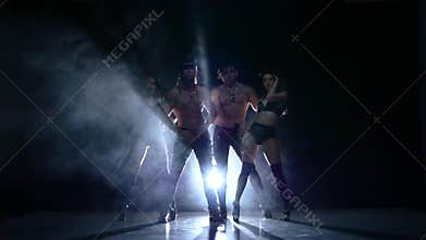 Striptease dancer. Strong men and woman. Slow