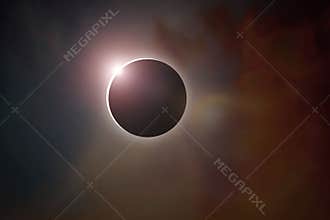 Total Solar Eclipse Phenomenon with Diamond Ring Effect on Dramatic Nebula Background