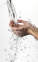 Hands and stream of water.