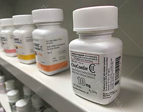 Ogden utah: july 16, 2016: oxycontin bottle on pharmacy shelf