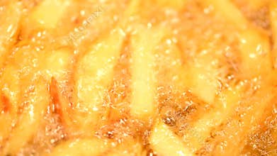 Preparing French Fries In Hot Boiling Oil With Fresh Potato