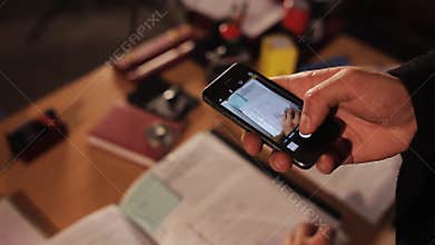 Spy on the phone taking pictures of secret files in the office