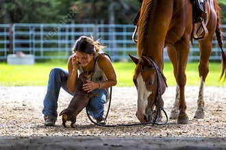 Farm girl on phone with horse and dog