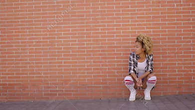 Young African American Girl Crouching