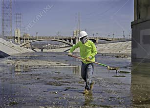 Man Cleaning Los Angeles River, California