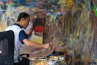 Oil Painter Working