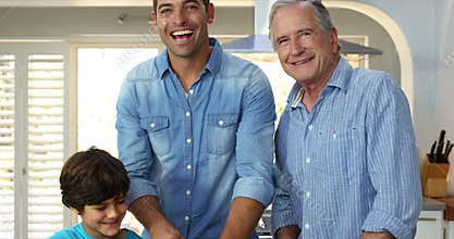multi generation men of the family are cooking