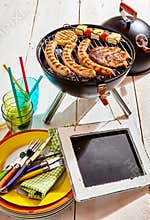 Blank menu slate at a summer picnic