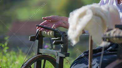Woman preparing the wool for processing