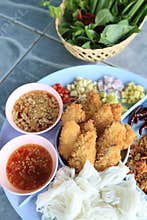 Complementing fish recipe - deep fried fish served with spices and herbs.