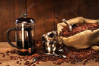 Sack of coffee beans with french press