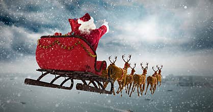 Composite image of santa claus riding on sleigh during christmas
