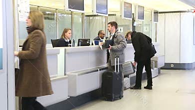 BERLIN, GERMANY - 28 JANUARY 2015: Man getting information at airport information desk at Tegel airport in Berlin.