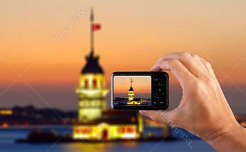 Travel concept. Hand making photo of city with camera. Istanbul. Turkey.