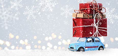 Retro toy car with christmas gifts