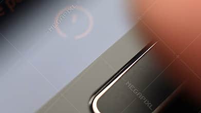 Fingerprint security screen unlocking on a smartphone.