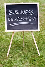 Business development written on a chalkboard