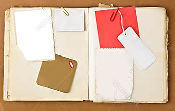 Old notebook with labels and photo frame