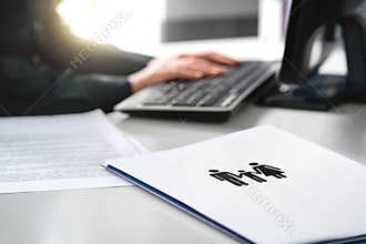 Family future, health care or finance planning concept. Woman writing insurance or mortgage application with computer.