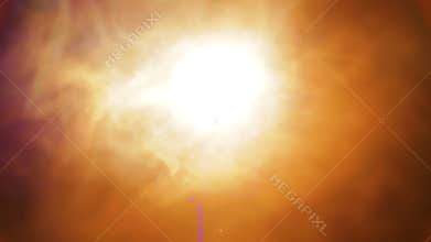 A bright beam of a revolving theatrical profile spotlight in clouds of cold smoke on the stage