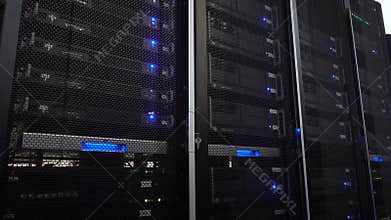 Server rack cluster in a data center. Moving camera. 4K.