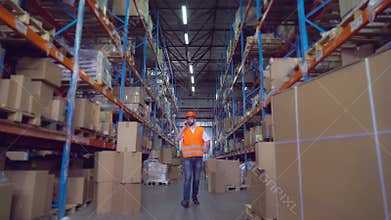 Employee working in storehouse.