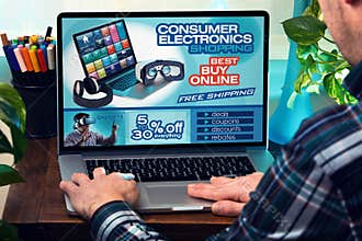 Man with laptop in site with an announcement of shop online of e
