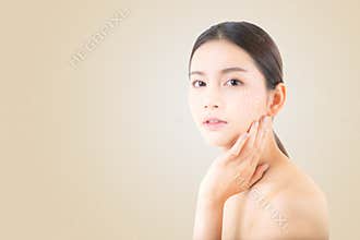 Portrait of beautiful asian woman makeup of cosmetic, girl hand touch cheek and smile